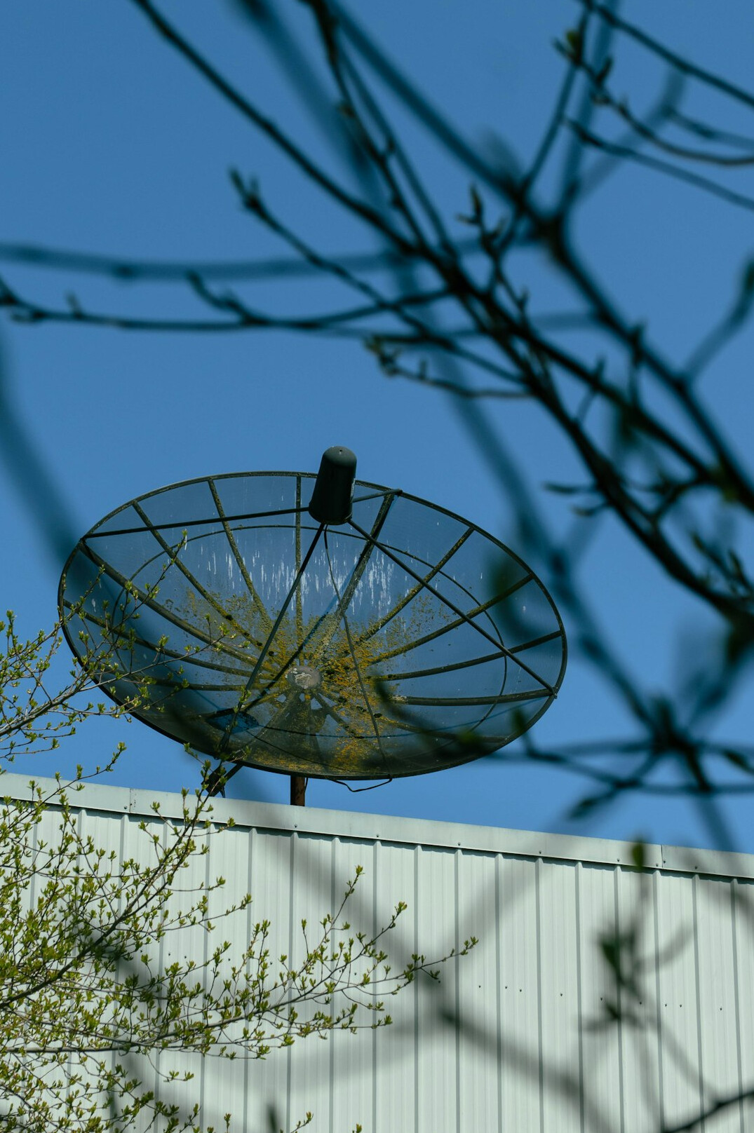 Outside broadcast van with satellite dish on location